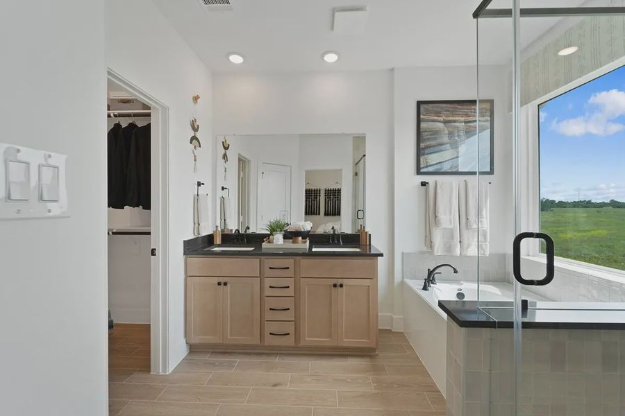 Furnished interior view inside a new home in Sienna Chateau, Sienna Plantation (Image 24).