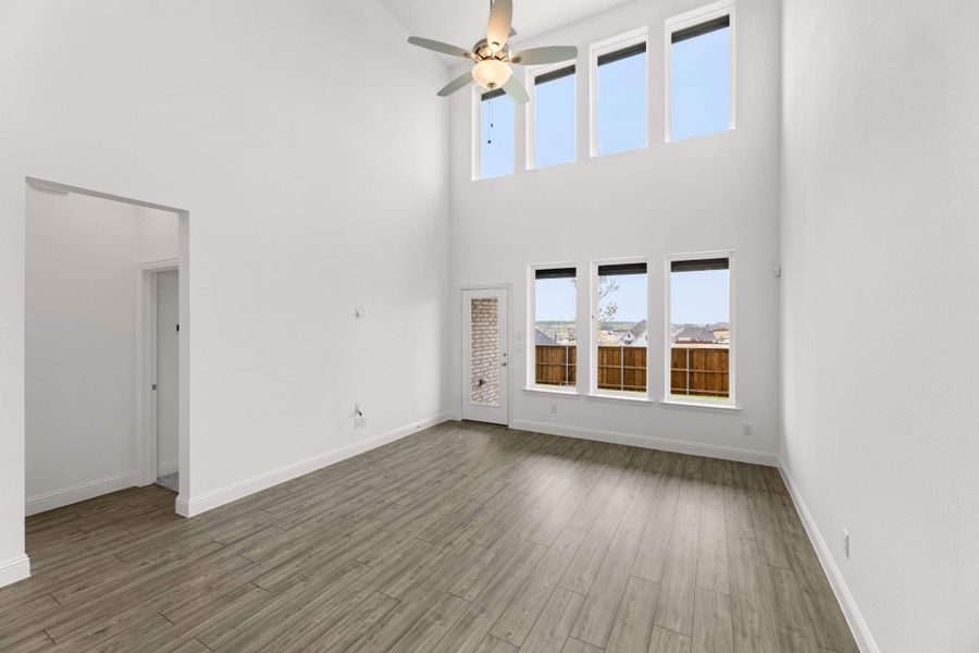 Representative unfurnished interior of a home built from the The Tucker by UnionMain Homes in Reunion, Rhome (Image 13).