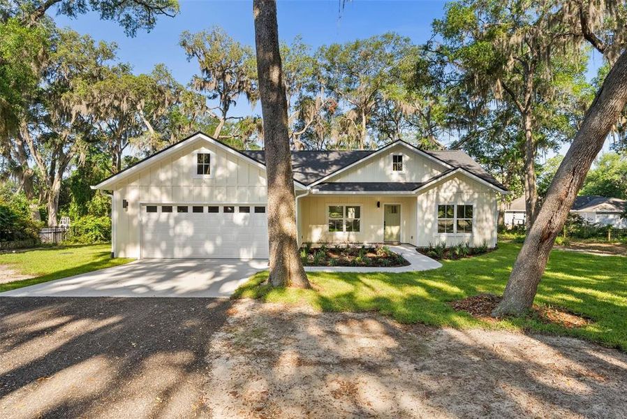Front exterior of a new home in , Melrose, FL, highlighting curb appeal (Image 16). Front exterior of a new home in , Melrose, FL, highlighting curb appeal (Image 16).