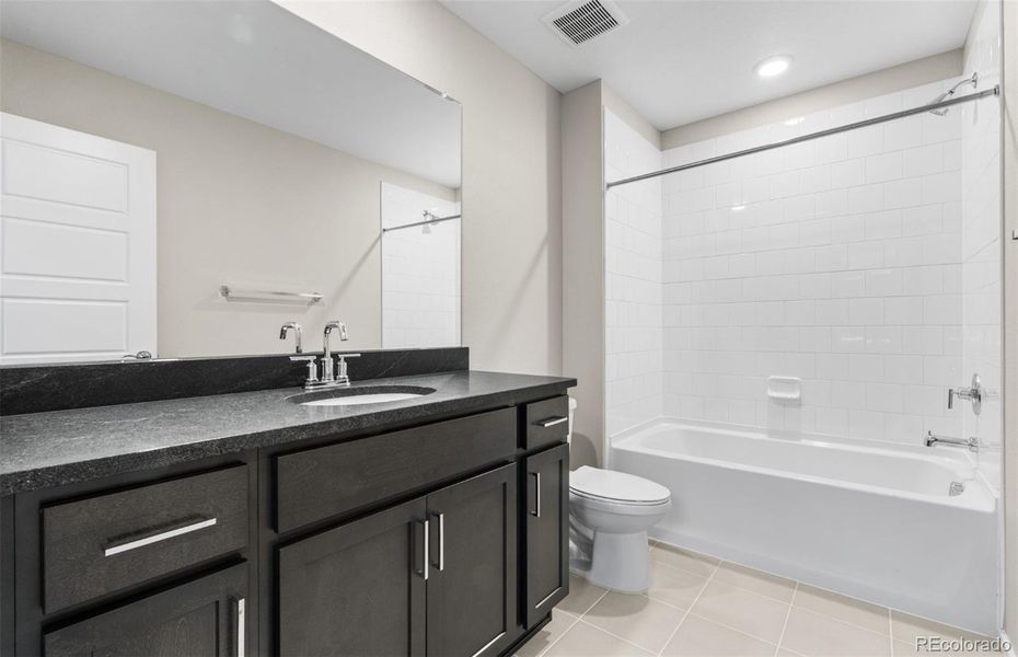 Furnished interior view inside a new home in Painted Prairie, Aurora (Image 7).