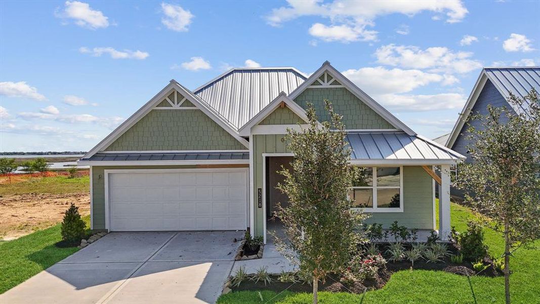 Front exterior of a new home in Grand Cay Harbour, Texas City, TX, highlighting curb appeal (Image 26). Front exterior of a new home in Grand Cay Harbour, Texas City, TX, highlighting curb appeal (Image 26).