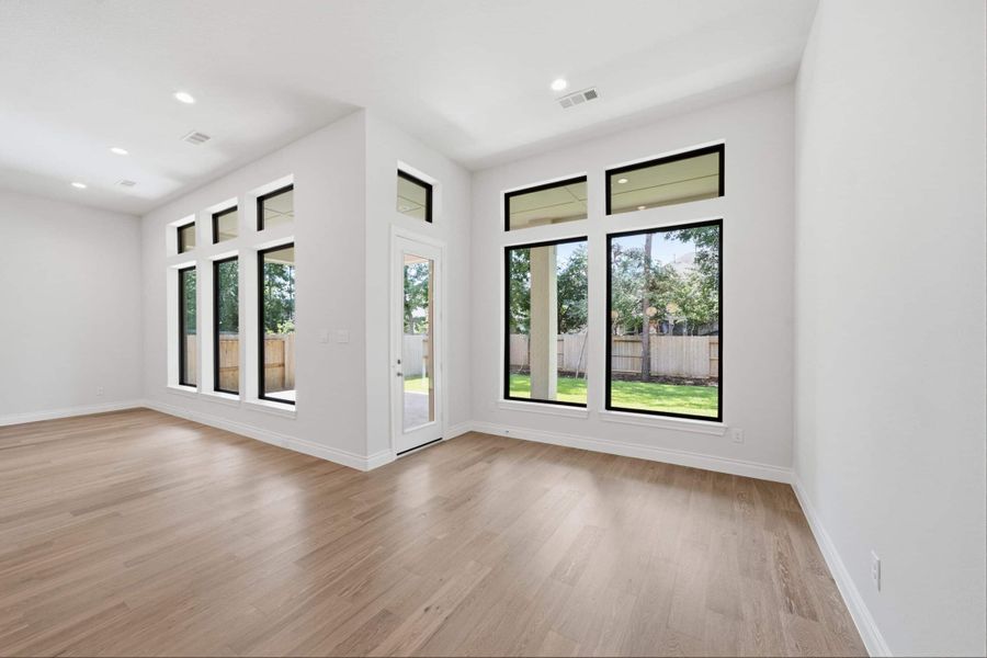 Spacious, unfurnished interior of a new home in The Woodlands Hills 65′, Willis (Image 22).