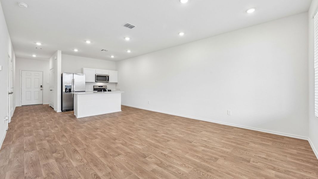 Spacious, unfurnished interior of a new home in Wayside, Uhland (Image 15). Spacious, unfurnished interior of a new home in Wayside, Uhland (Image 15).