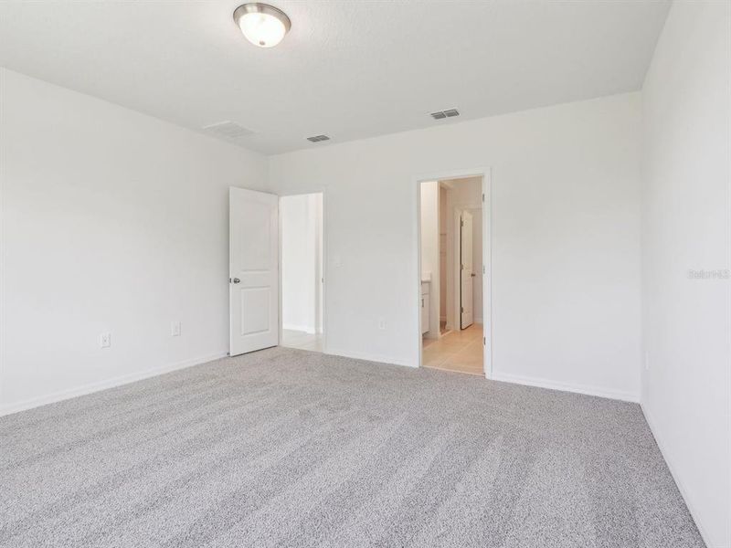 Spacious, unfurnished interior of a new home in The Reserve at Van Oaks, Auburndale (Image 22).