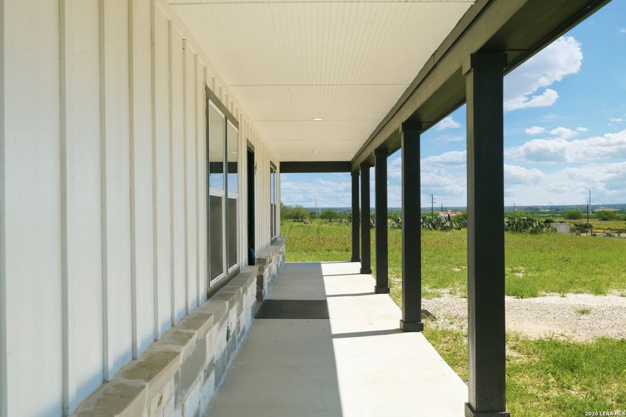 Exterior details and patio area of a home in , Floresville (Image 13).