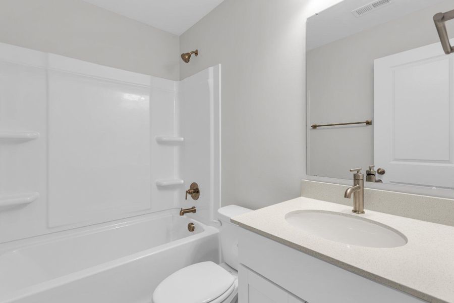 Furnished interior view inside a new home in Sweetgrass Station, Summerville (Image 6).