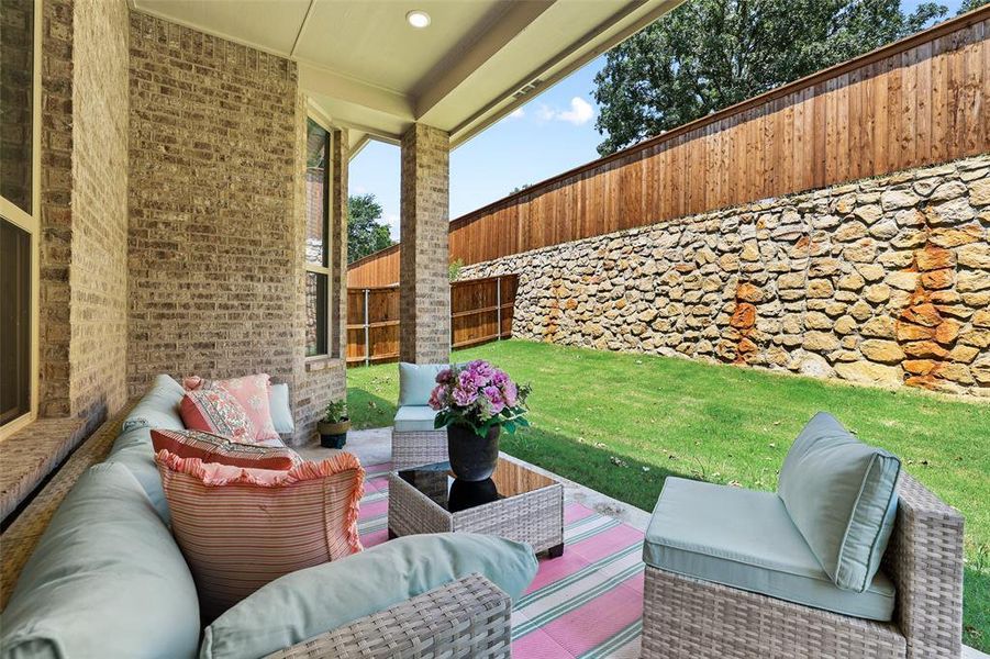 Expanded covered outdoor patio is the perfect spot to relax Expanded covered outdoor patio is the perfect spot to relax