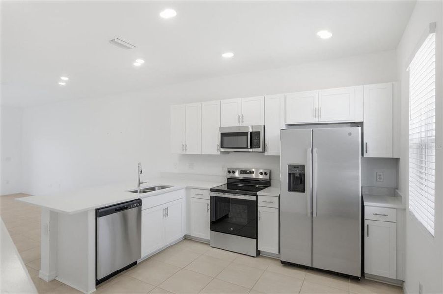 Furnished interior view inside a new home in , Sarasota (Image 14).