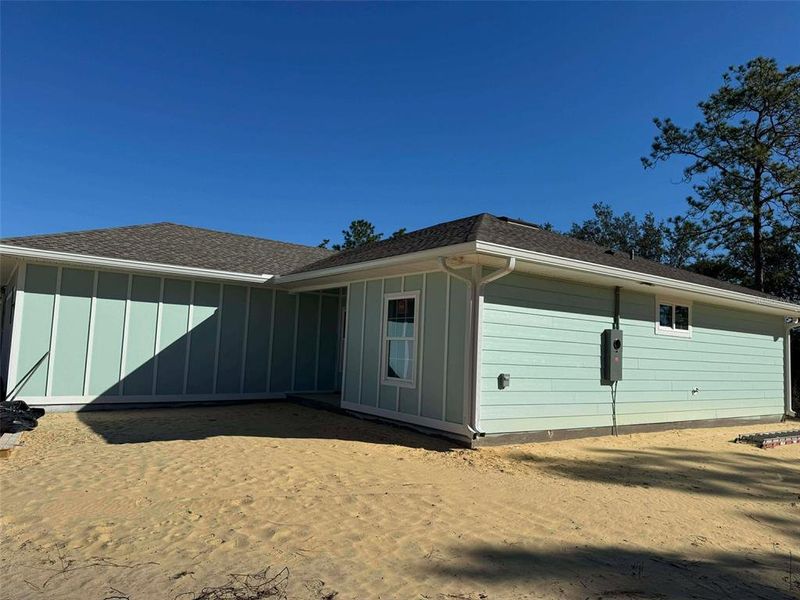 Exterior details and patio area of a home in , Williston (Image 3).