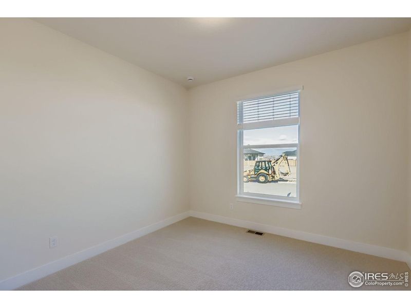 Spacious, unfurnished interior of a new home in RainDance, Windsor (Image 21).