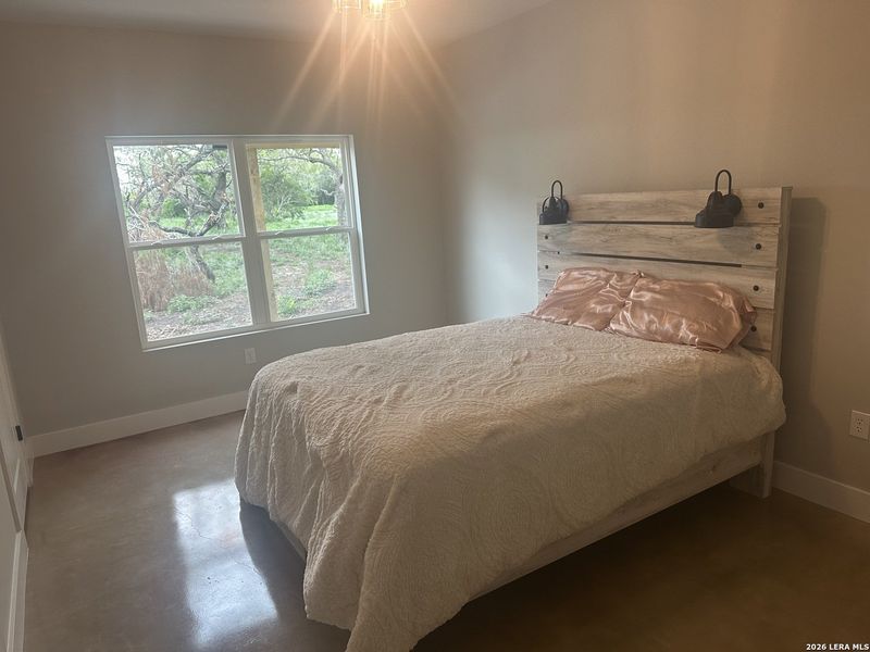 Furnished interior view inside a new home in , Karnes City (Image 9).