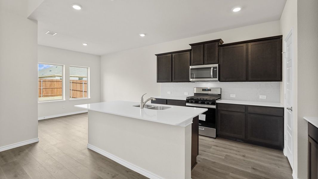 Furnished interior view inside a new home in Liberty Crossing, Royse City (Image 3).