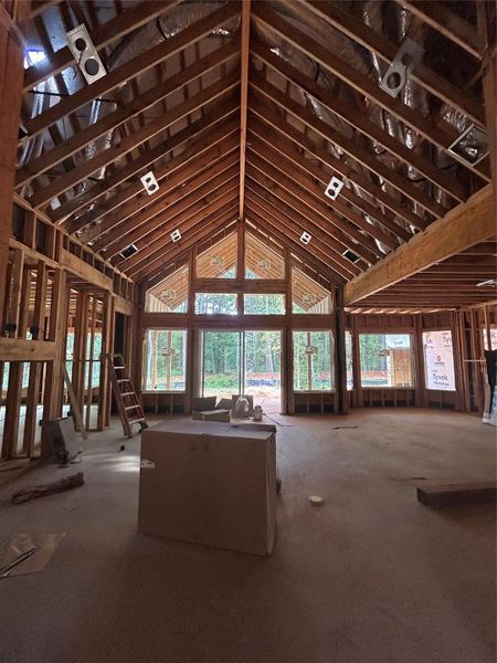 Generously sized open concept family room & Kitchen showcased by large picture windows.