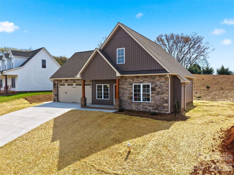 Front exterior of a new home in , Hickory, NC, highlighting curb appeal (Image 2). Front exterior of a new home in , Hickory, NC, highlighting curb appeal (Image 2).