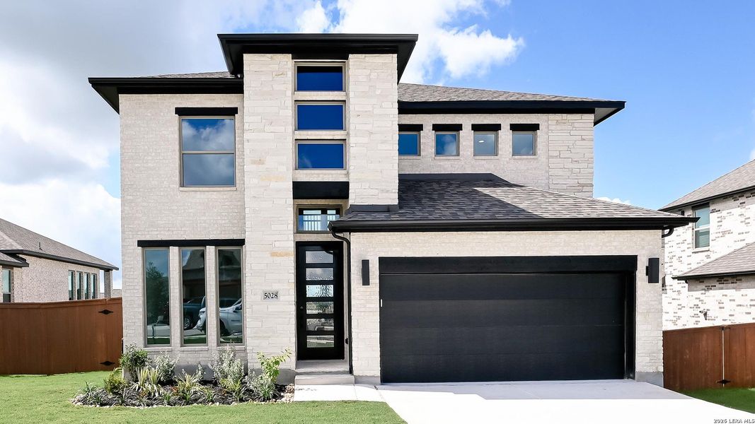 Front exterior of a new home in Homestead, Schertz, TX, highlighting curb appeal (Image 2).