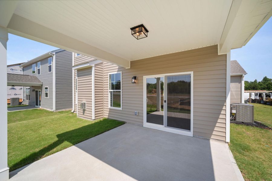 Exterior details and patio area of a home in Hayes Village, Greensboro (Image 2).