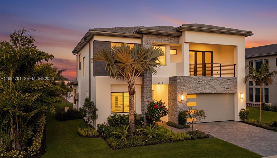 East facing front of home next to tree-lined easement on south side