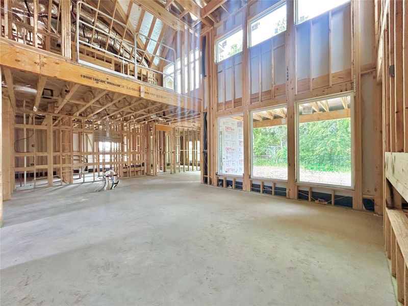 Open-Concept Kitchen Flowing Seamlessly Into the Living Area. Construction Photo as of 5/20/2026
