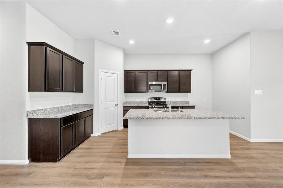 Furnished interior view inside a new home in Kings Way, Denton (Image 12).