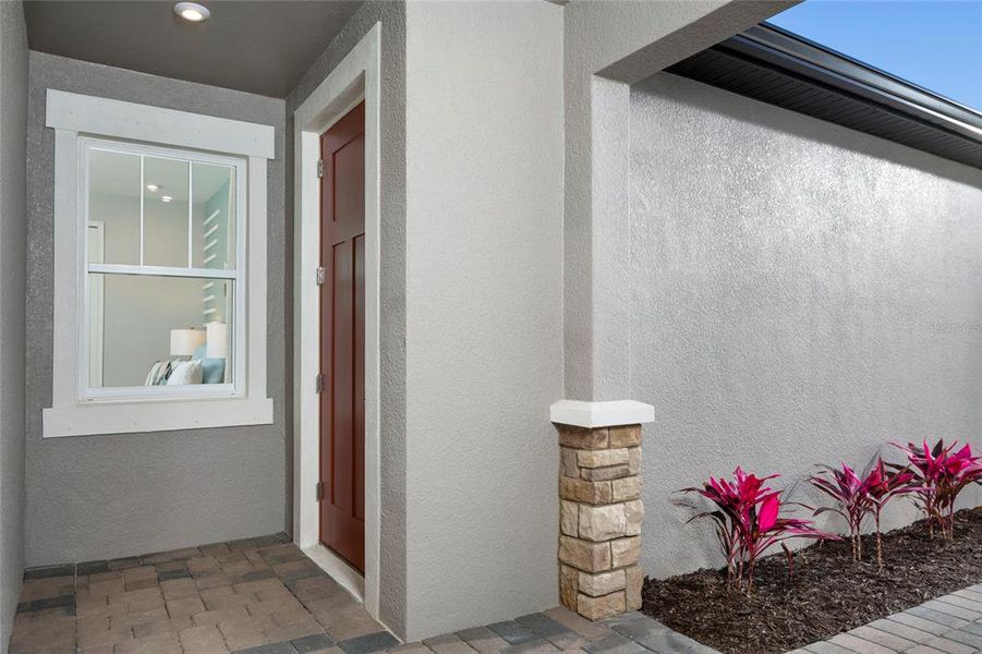 Exterior details and patio area of a home in Sunstone at Wellen Park, Venice (Image 1).