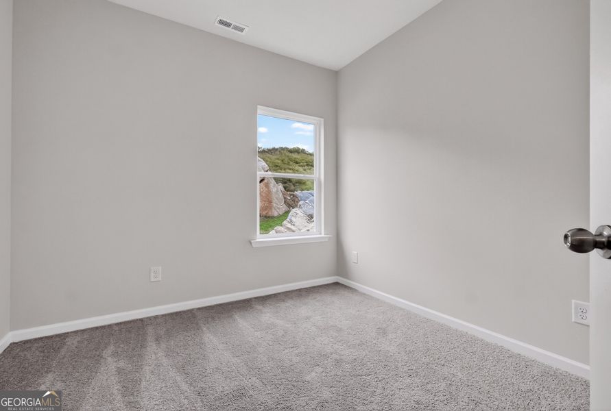 Spacious, unfurnished interior of a new home in Stonebridge North, Macon (Image 23).