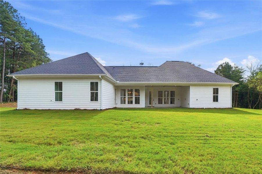 Exterior details and patio area of a home in , White (Image 4).