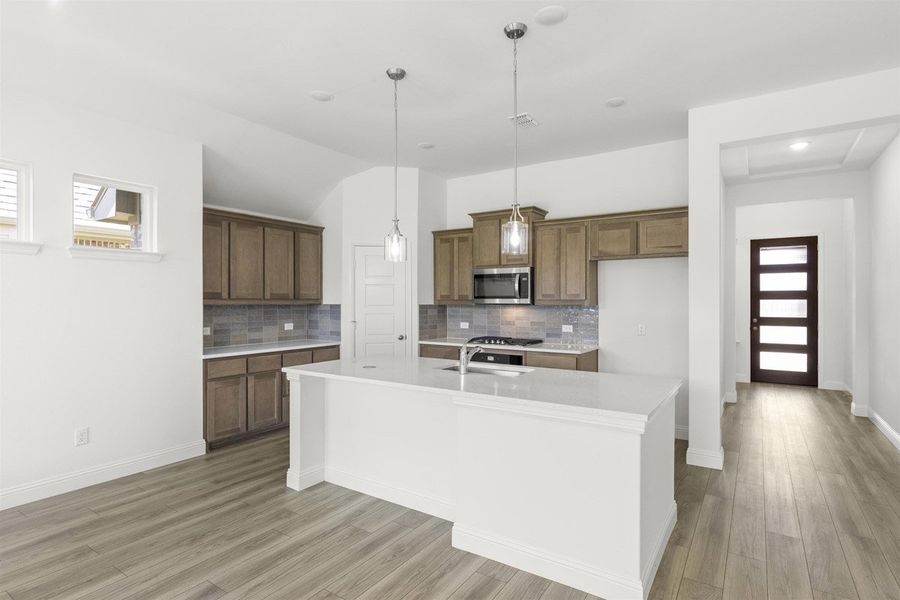 Representative furnished interior of a home built from the Trenton by Pacesetter Homes in Keeneland, Aubrey (Image 5).