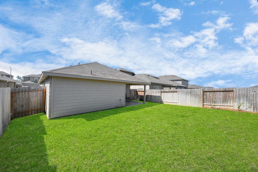 Front exterior of a new home in , Spring, TX, highlighting curb appeal (Image 18).