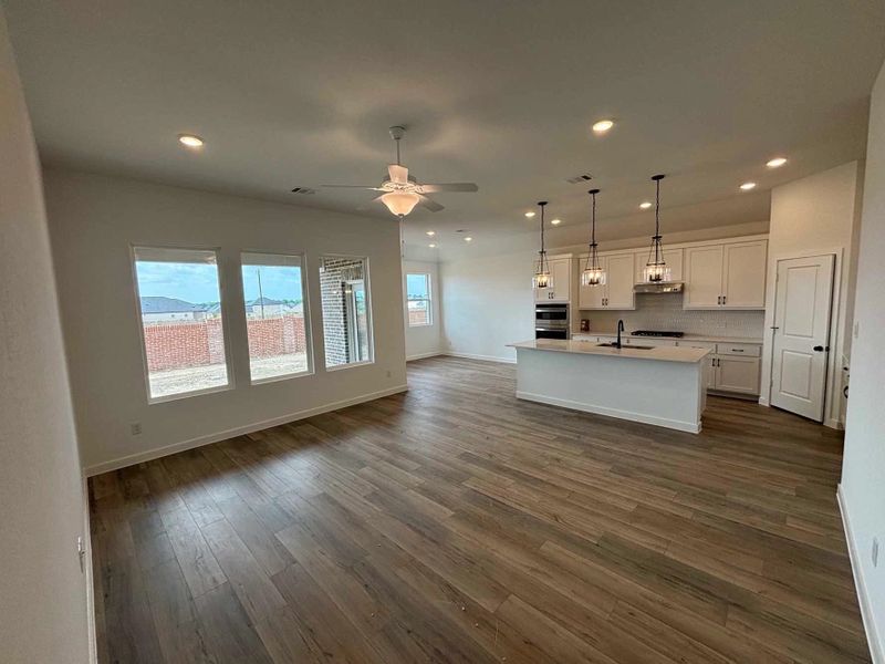 Open Kitchen-Living-Dining Room Construction Progress featuring the Harmony Collection