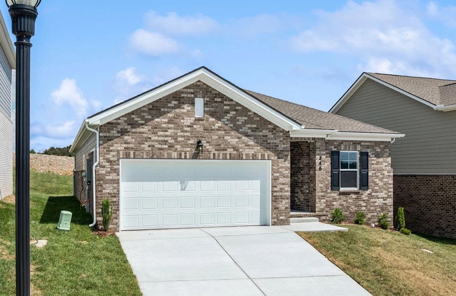Front exterior of a new home in Cades Bluff, Lebanon, TN, highlighting curb appeal (Image 2).