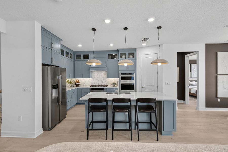 Representative furnished interior of a home built from the Coral Grand by Pulte Homes in Lakehaven Estates, Clermont (Image 8). Representative furnished interior of a home built from the Coral Grand by Pulte Homes in Lakehaven Estates, Clermont (Image 8).