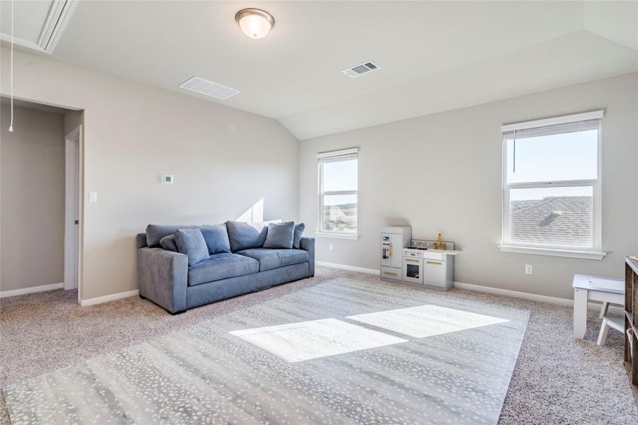 Upstairs game room with hill country views.