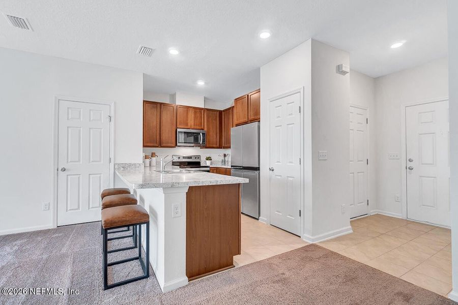 Furnished interior view inside a new home in Orchard Park Townhomes, St. Augustine (Image 6). Furnished interior view inside a new home in Orchard Park Townhomes, St. Augustine (Image 6).