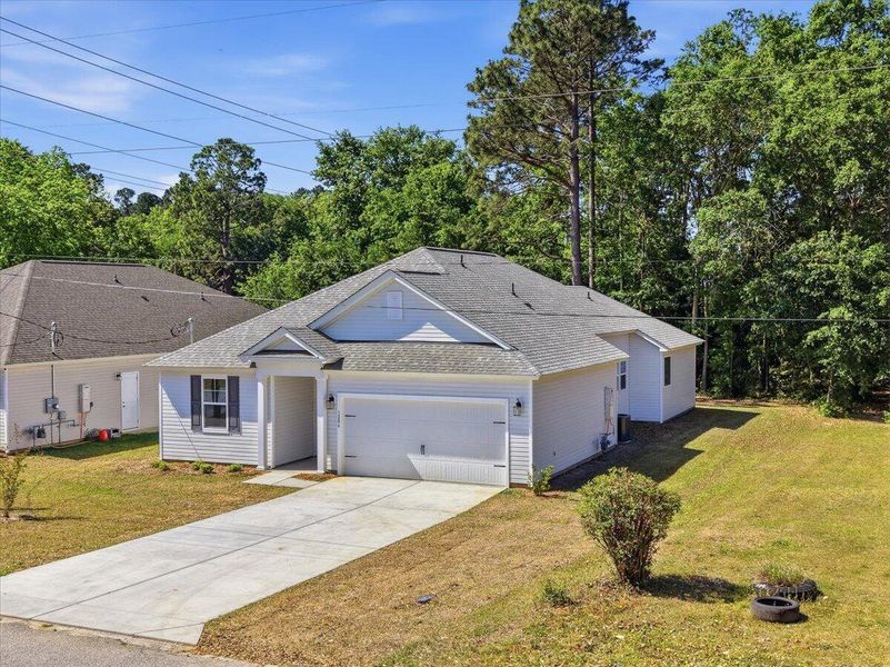 Front exterior of a new home in , Orangeburg, SC, highlighting curb appeal (Image 31).