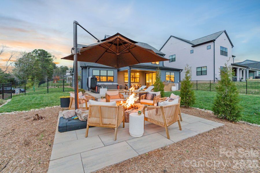 Exterior details and patio area of a home in Amara Chase, Huntersville (Image 25).