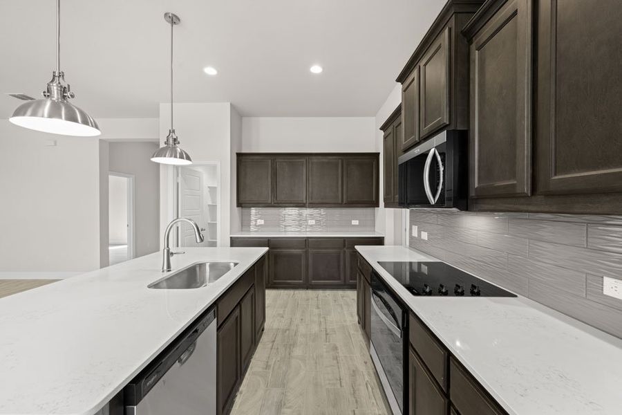 Front exterior of a new home in Still Water Lake, Godley, TX, highlighting curb appeal (Image 5). Front exterior of a new home in Still Water Lake, Godley, TX, highlighting curb appeal (Image 5).