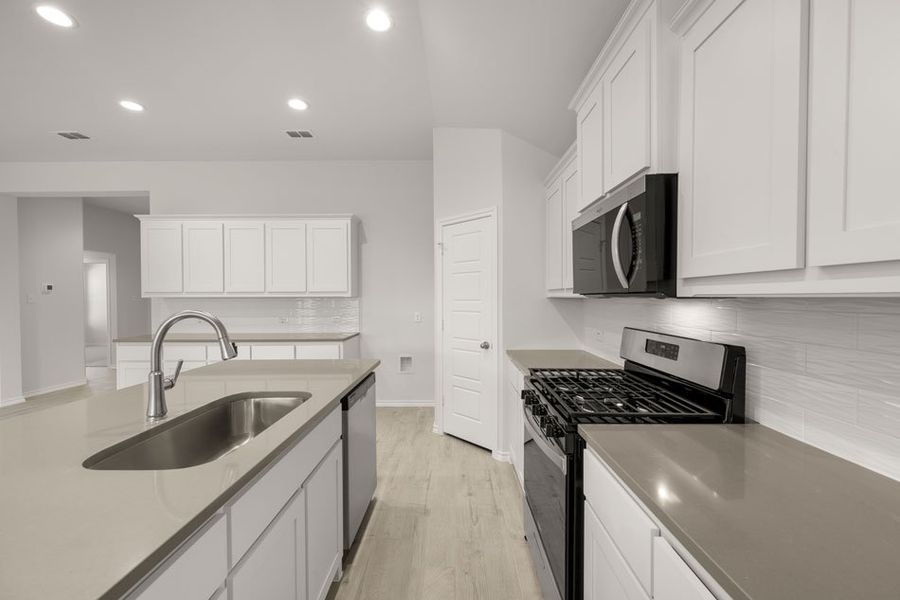 Representative exterior photo of a completed home built from the Austin by Impression Homes in Baker Farms, Cleburne, TX (Image 6).