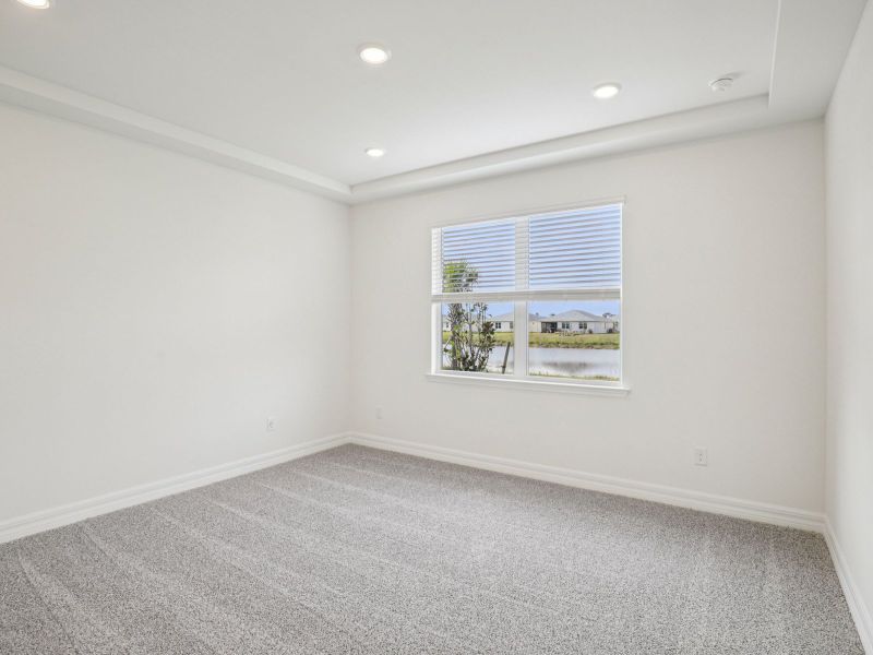 Spacious, unfurnished interior of a new home in Crescent Lakes - Reserve Series, Punta Gorda (Image 13).