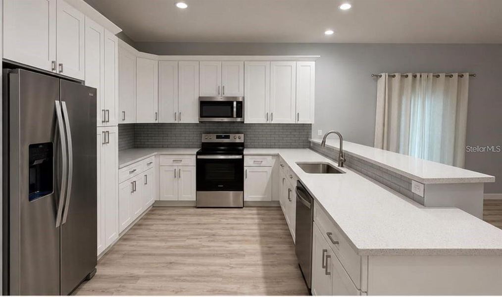 Furnished interior view inside a new home in , Daytona Beach (Image 5).