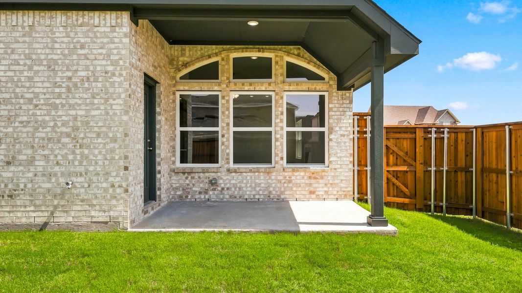 Exterior details and patio area of a home in Green Meadows Premier, Celina (Image 23).