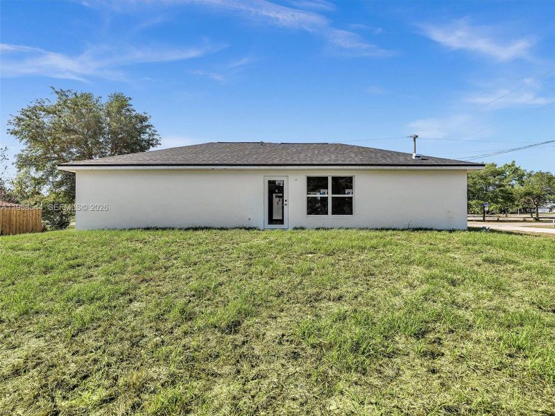 Exterior details and patio area of a home in , Lehigh Acres (Image 4).