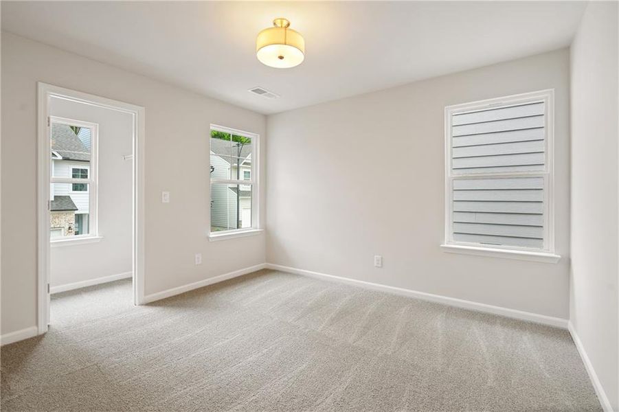 Spacious, unfurnished interior of a new home in The Village at Shallowford, Kennesaw (Image 19).