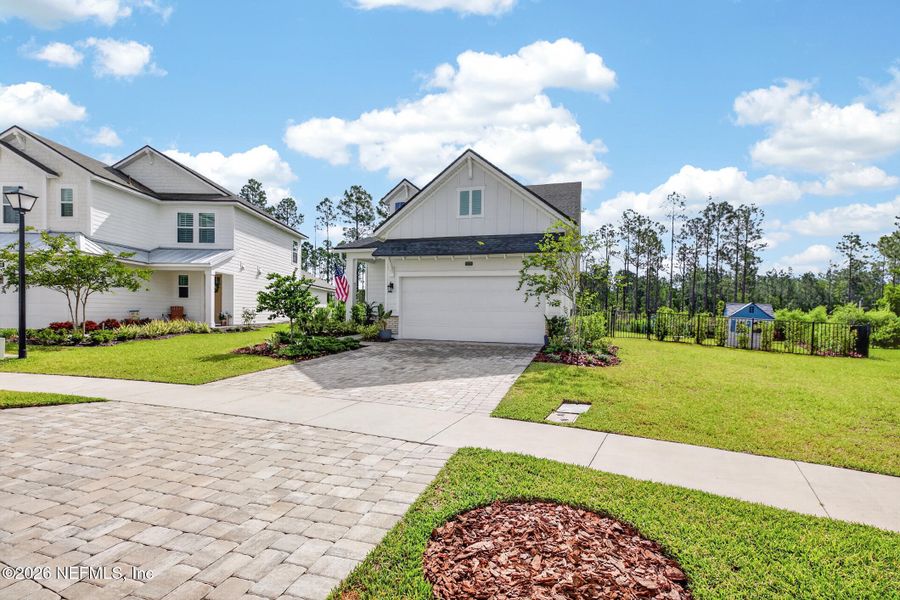 Front exterior of a new home in , Ponte Vedra, FL, highlighting curb appeal (Image 26).