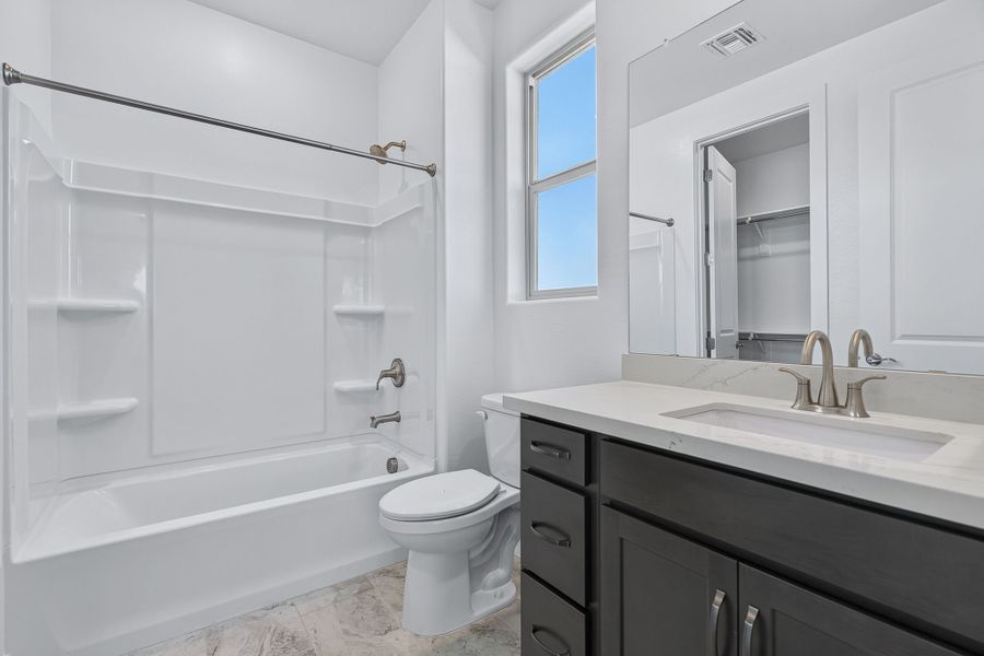 Furnished interior view inside a new home in The Grove at El Cidro, Goodyear (Image 17).