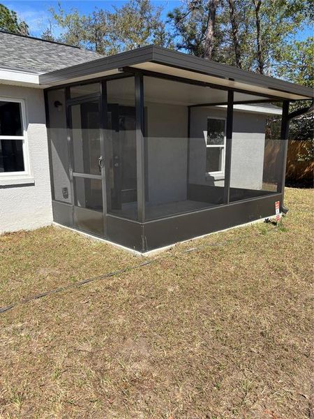 Exterior details and patio area of a home in , Citrus Springs (Image 30).