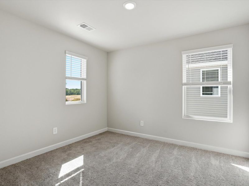 Spacious, unfurnished interior of a new home in Brayfield Manor - Heritage Collection, Wellford (Image 18).