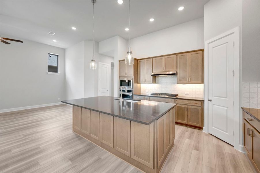 Furnished interior view inside a new home in Sienna - Landmark Row Collection, Missouri City (Image 7).