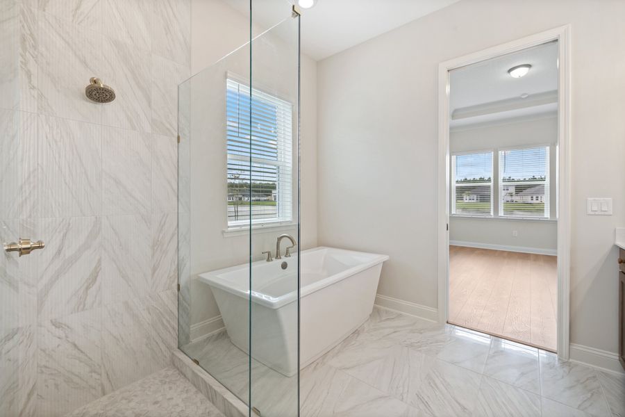 Representative furnished interior of a home built from the Aurora by Riverside Homes in Hidden Creek at SilverLeaf, St. Augustine (Image 19).