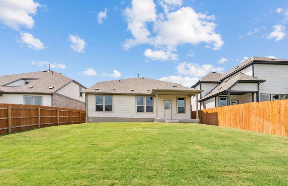 Exterior details and patio area of a home in Saddleback at Santa Rita Ranch, Liberty Hill (Image 20). Exterior details and patio area of a home in Saddleback at Santa Rita Ranch, Liberty Hill (Image 20).