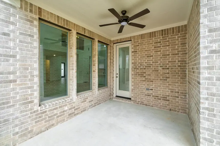 Exterior details and patio area of a home in Parmer Ranch, Georgetown (Image 25). Exterior details and patio area of a home in Parmer Ranch, Georgetown (Image 25).